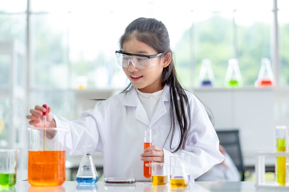 Little Girl Scientist Enjoying lab experiments